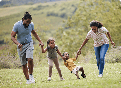 Happy family having fun outside