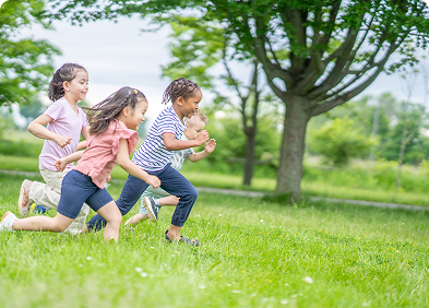 Kids playing outdoors in summer