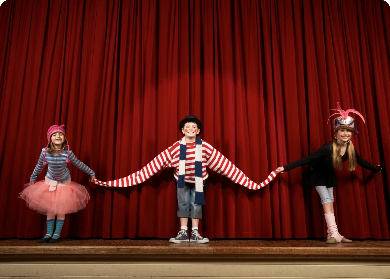 Young actors holding hands